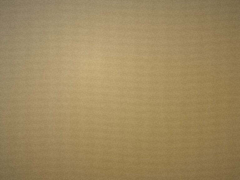 A raw brass sheet on the workbench